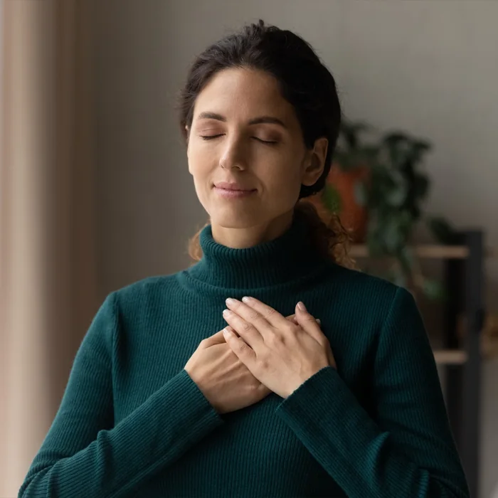 Calm woman with eyes closed