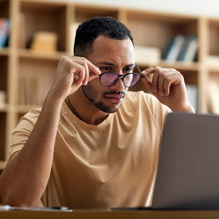 Man concentrating at his laptop